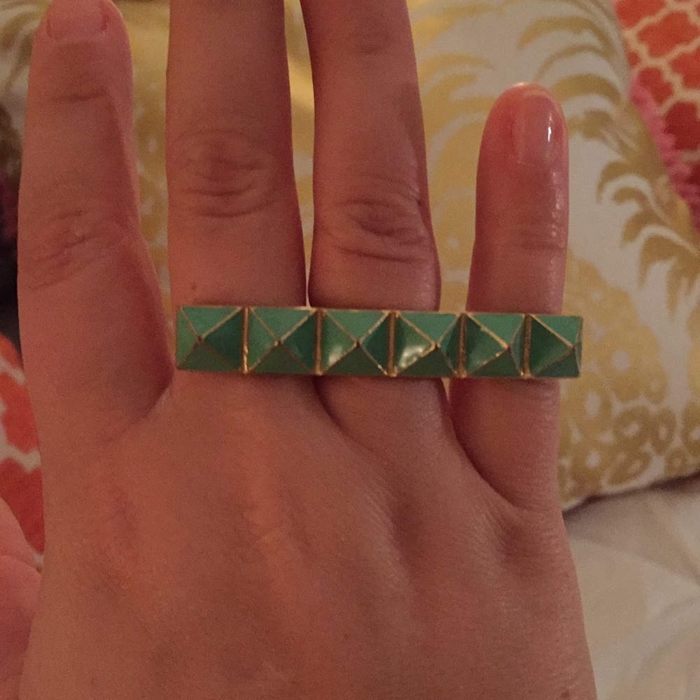 Green and gold costume jewelry ring